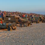 People and vehicles on Utah Beach - The Morning of June 6th, 2024